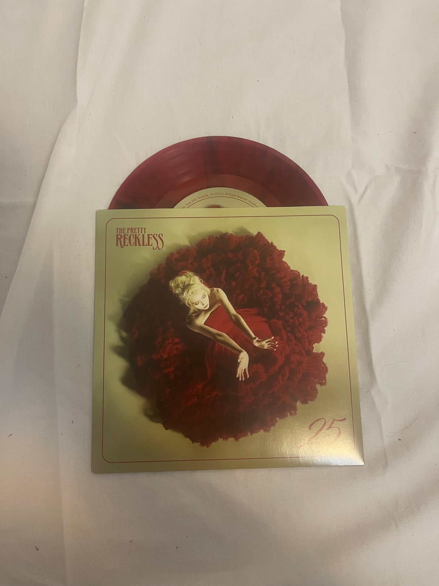 The Pretty Reckless - 25 (webstore exclusive translucent red with black swirl 7” vinyl)