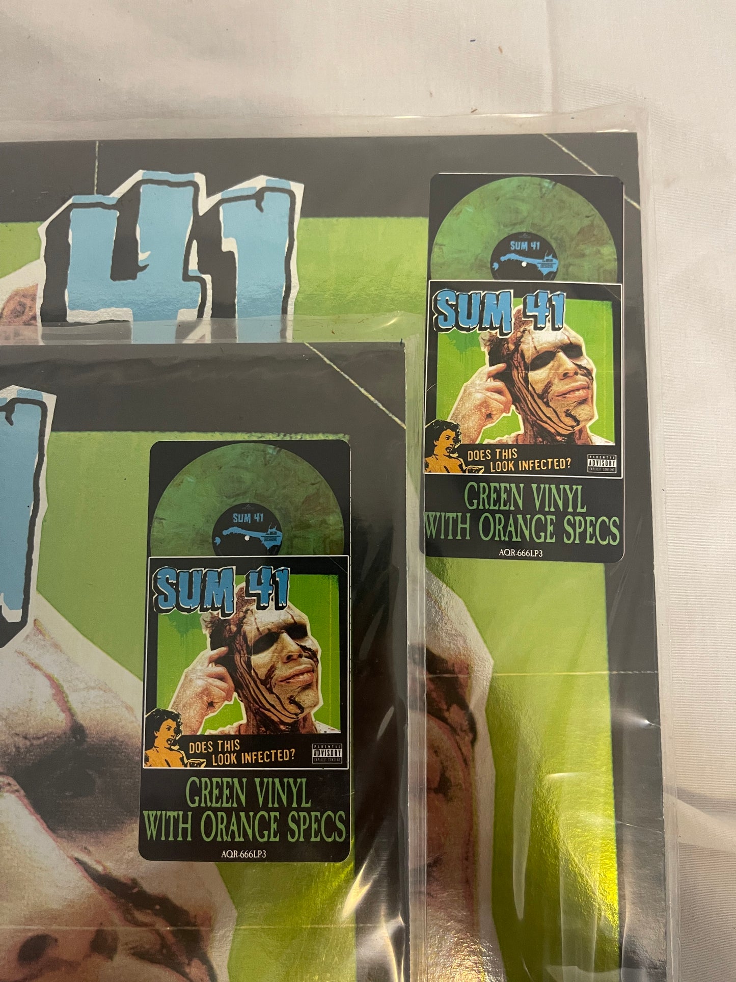 Sum 41 - Does This Look Infected? (Record Store Day Black Friday Canada exclusive Green with Orange Specs vinyl)