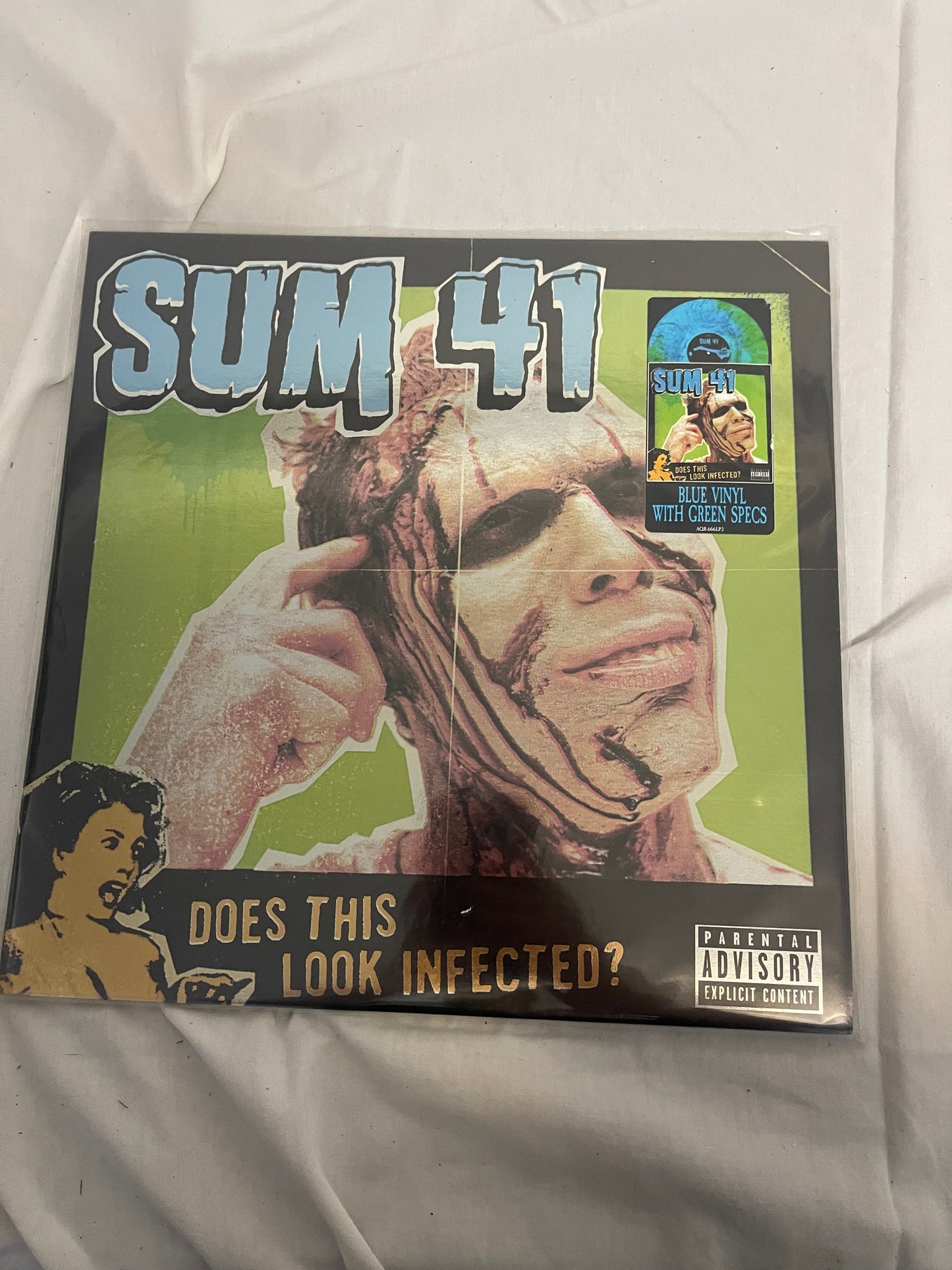 Sum 41 - Does This Look Infected? (Record Store Day Black Friday Canada exclusive Blue with green specs vinyl)