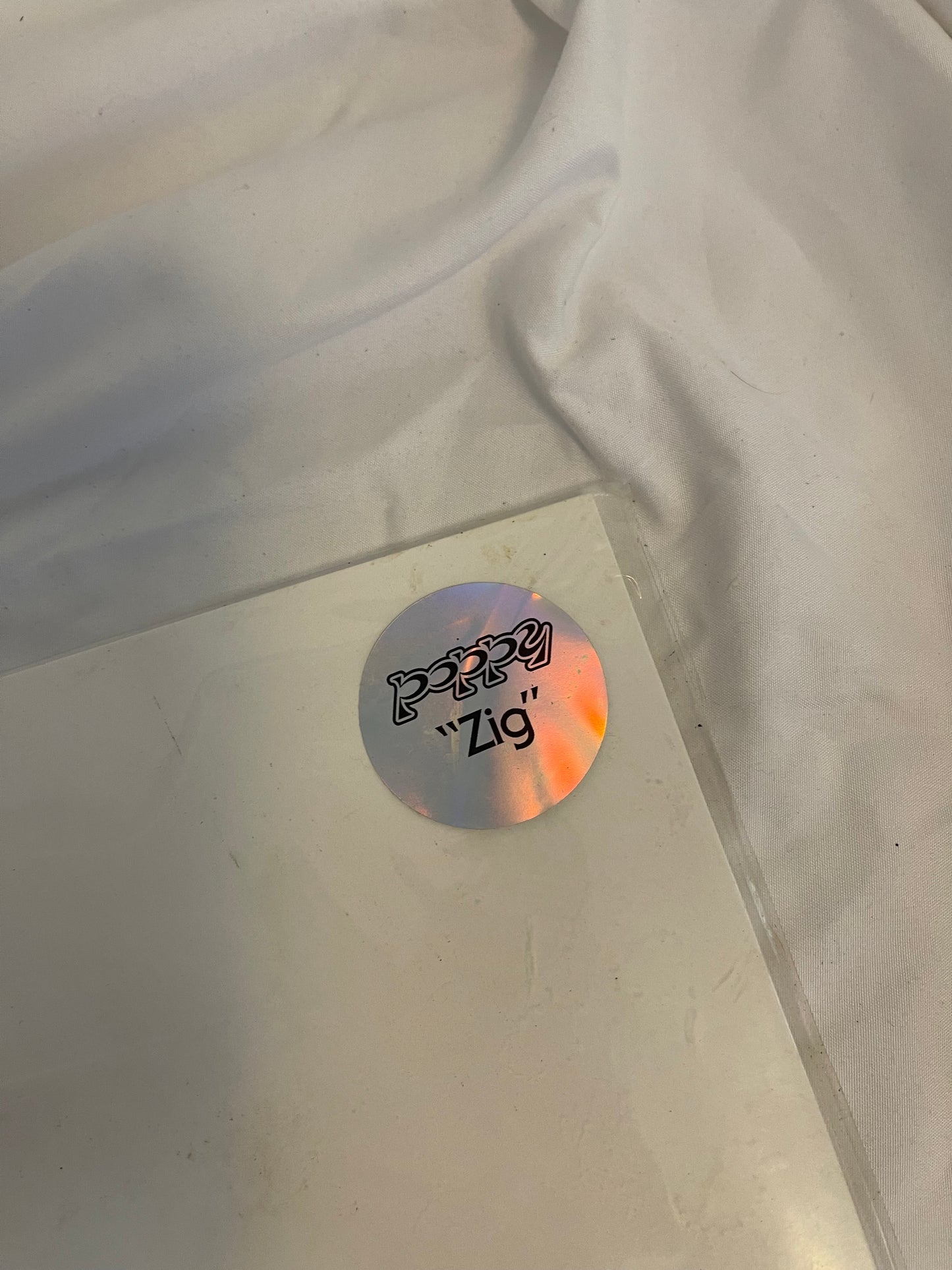 Poppy - Zig (Exclusive black inside transparent purple with heavy black splatter vinyl)