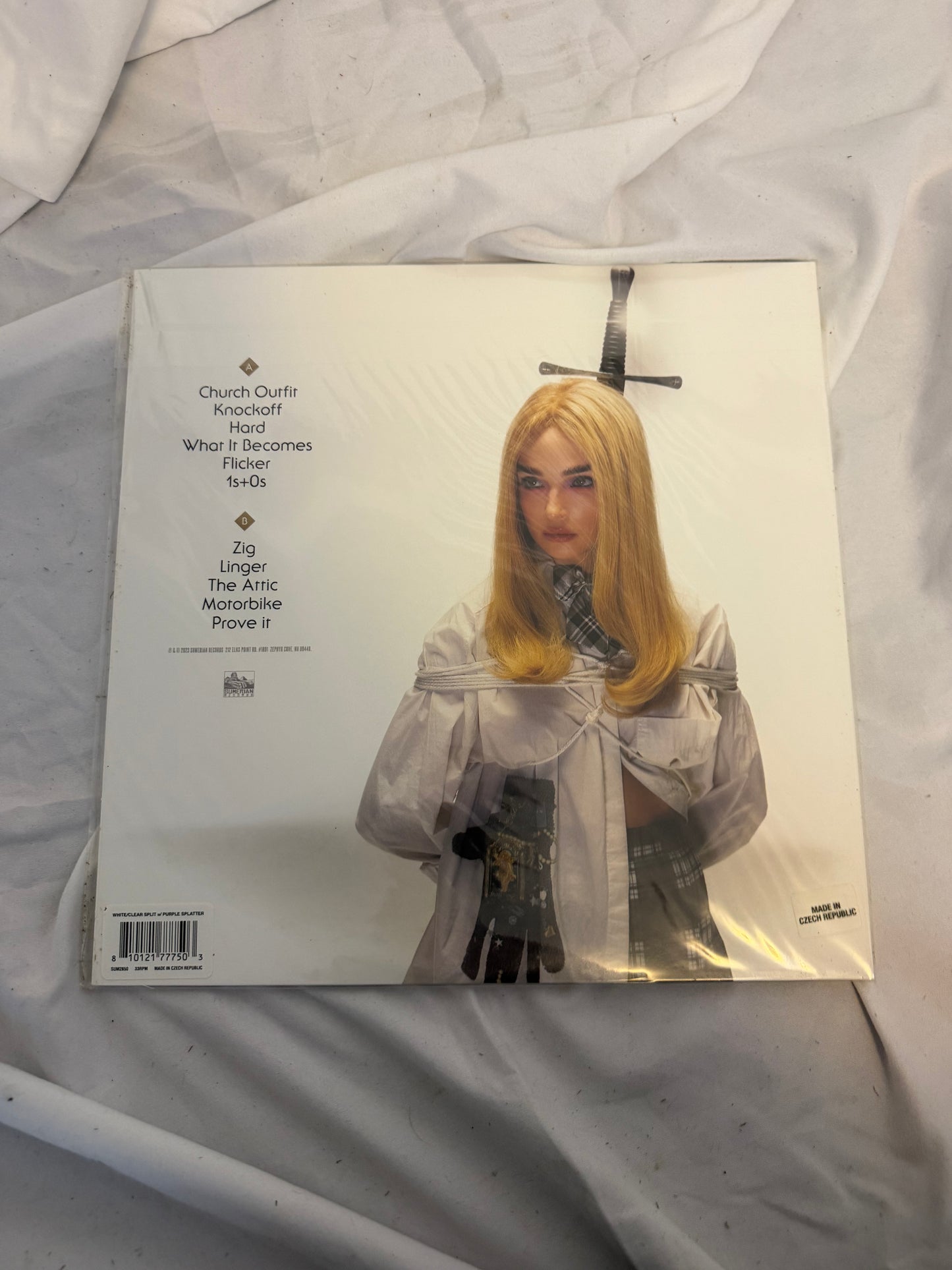 Poppy - Zig (Sumerian exclusive ultra clear/white split with purple splatter vinyl)
