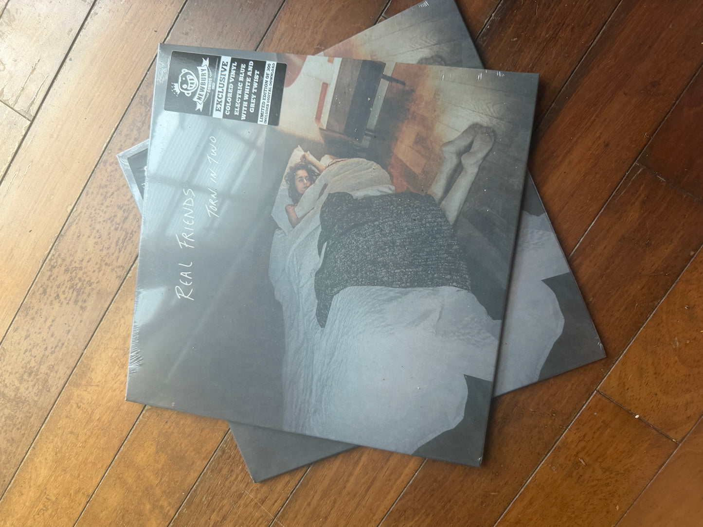 Real Friends - Torn In Two (Newbury Comics exclusive electric blue with white and grey twist vinyl)