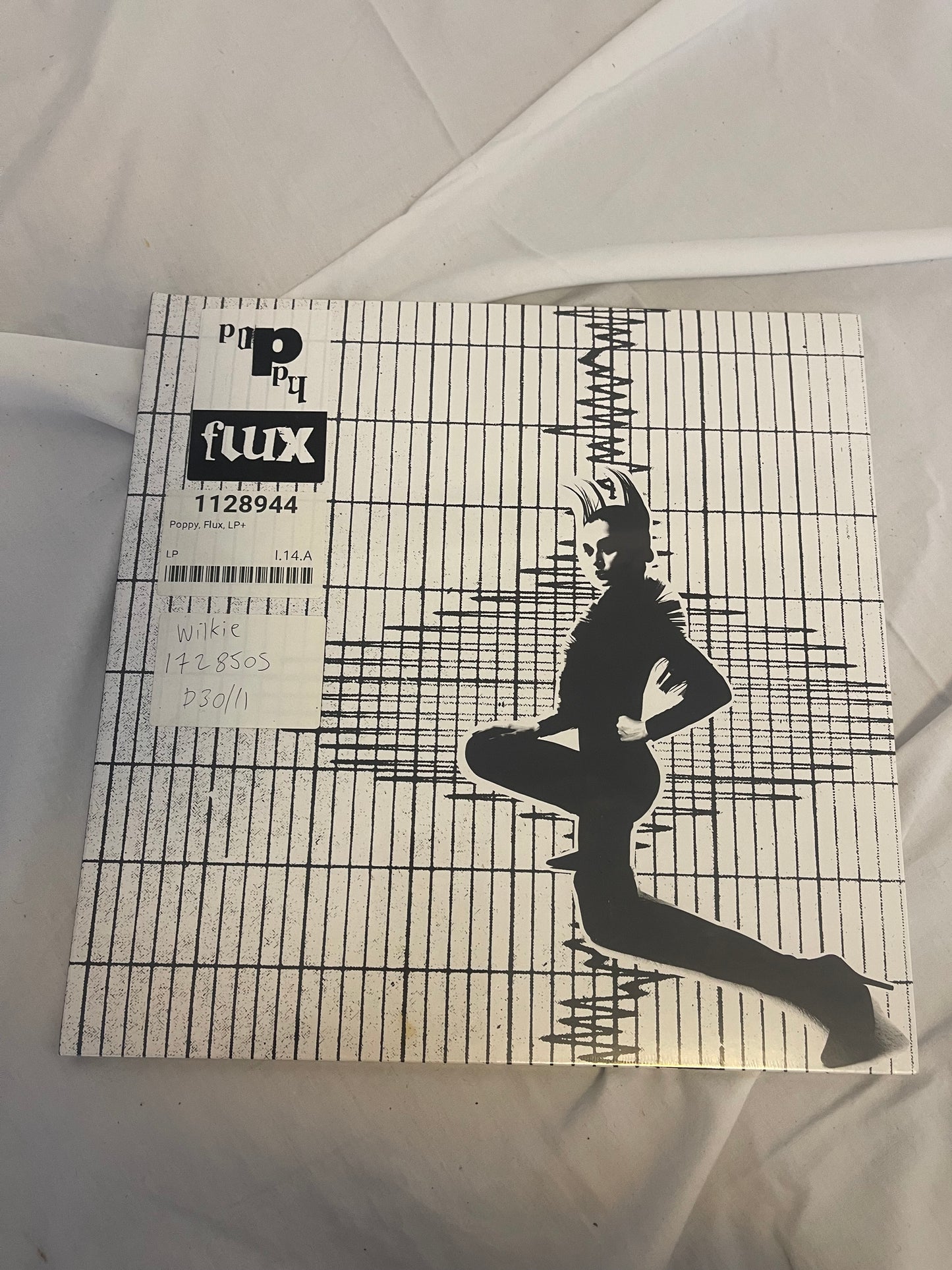 Poppy - Flux (Exclusive black inside aqua blue vinyl)