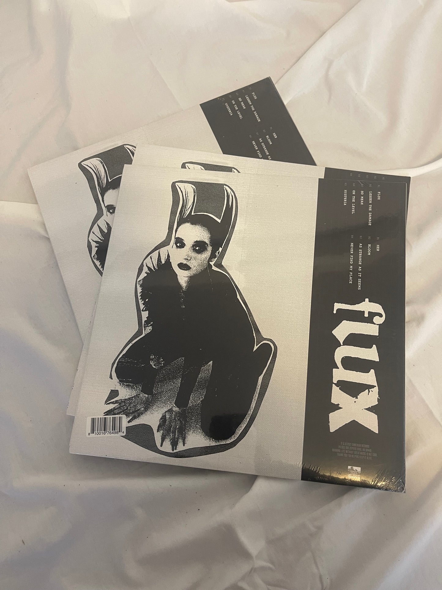 Poppy - Flux (Exclusive black and aqua blue galaxy vinyl)