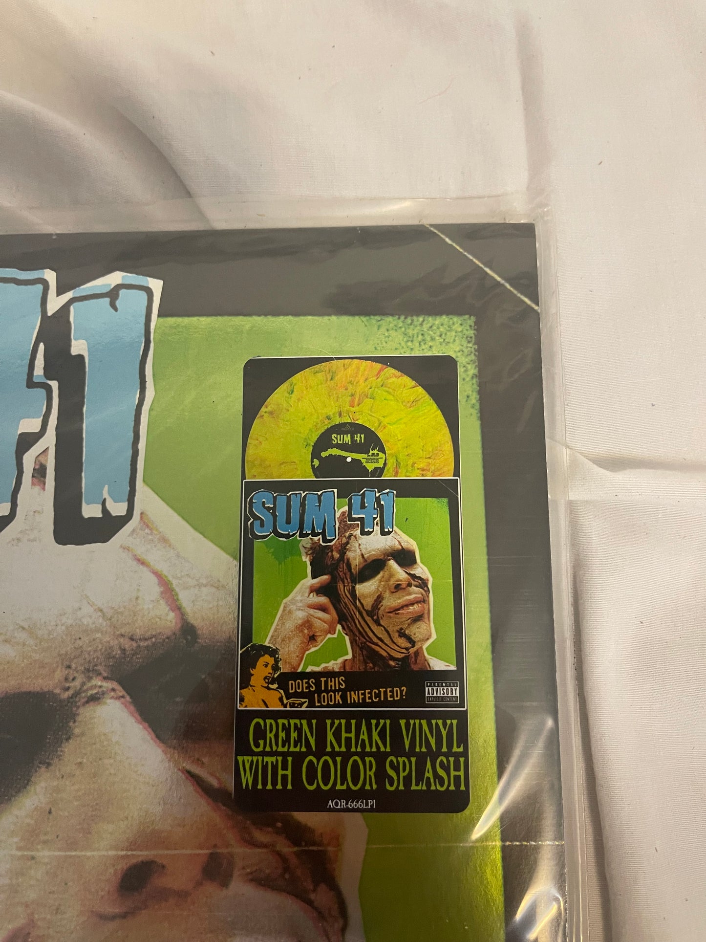 Sum 41 - Does This Look Infected? (Record Store Day Black Friday Canada exclusive Green Khaki with Color Splash vinyl)