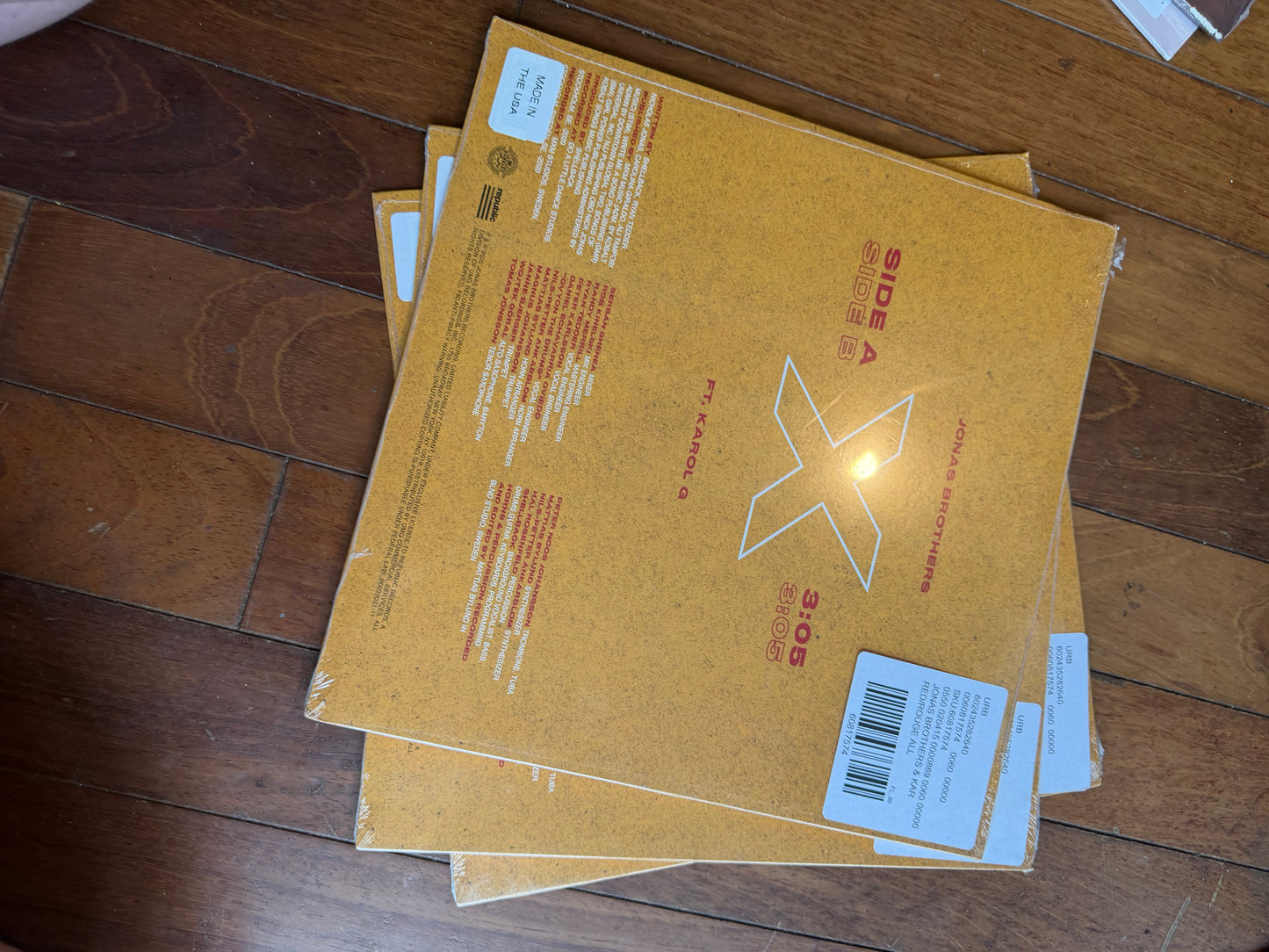 Jonas Brothers, Karol G - X (Urban Outfitters exclusive red vinyl)