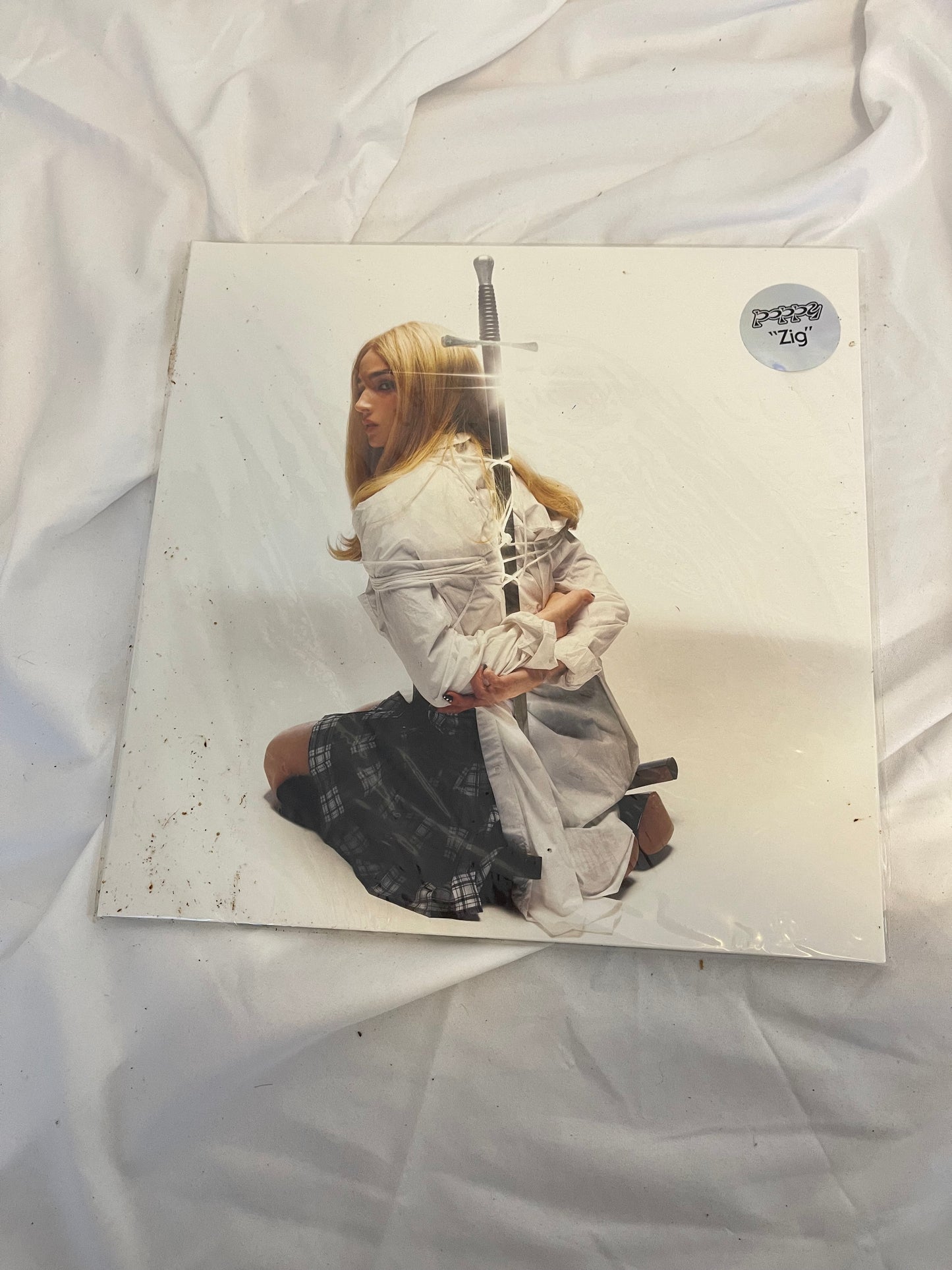Poppy - Zig (Sumerian exclusive ultra clear/white split with purple splatter vinyl)