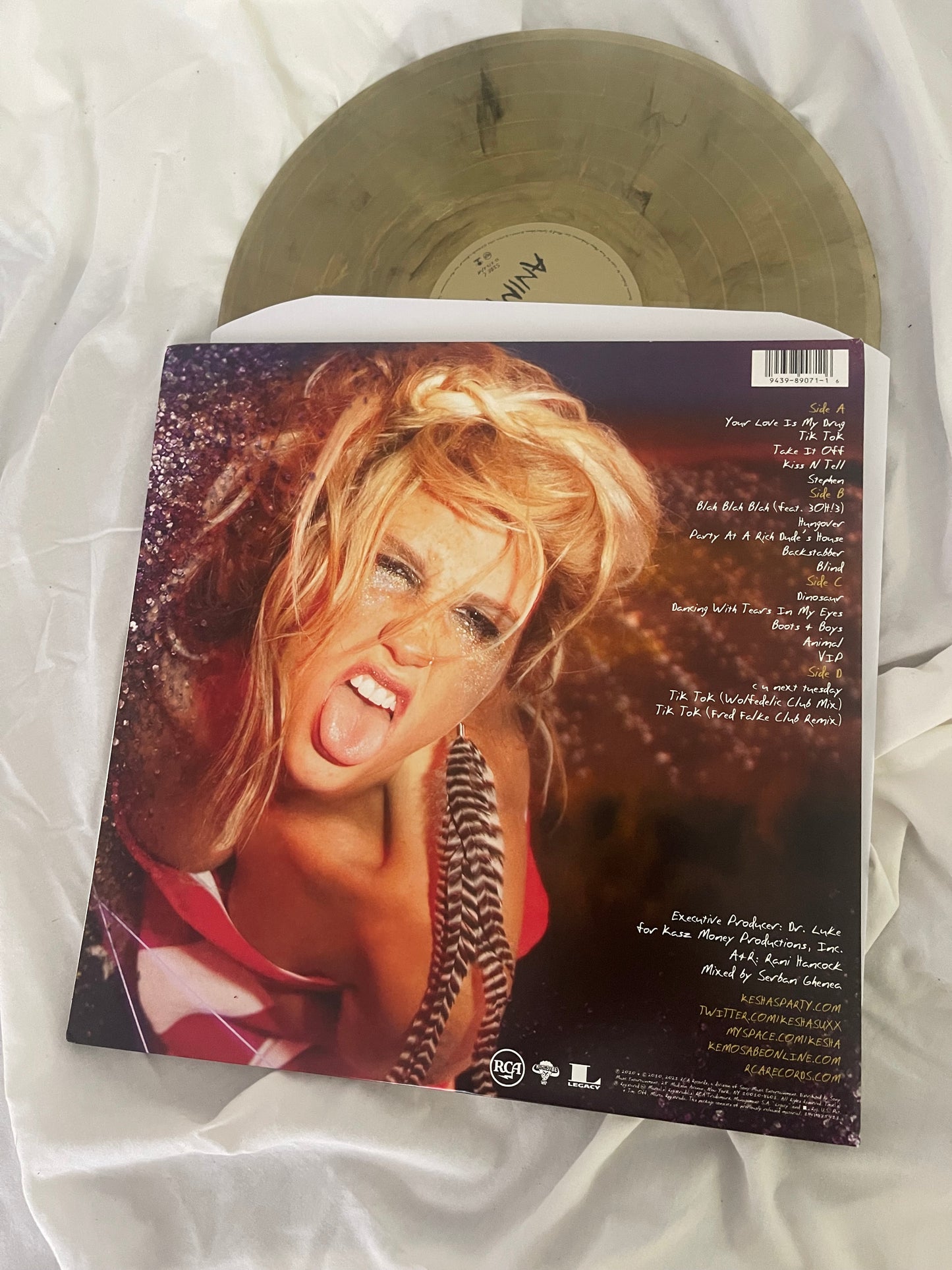 Kesha - Animal (Webstore exclusive clear with gold and black swirl vinyl)