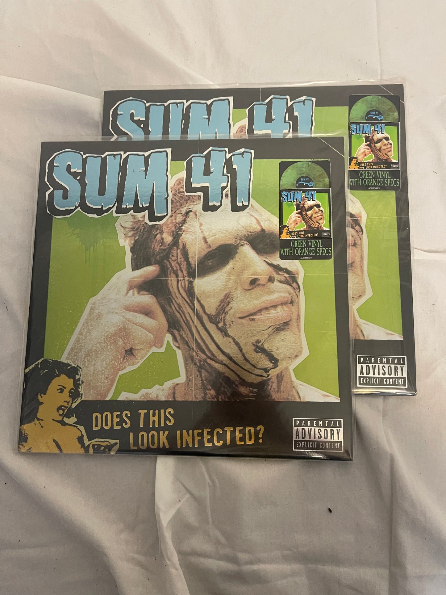 Sum 41 - Does This Look Infected? (Record Store Day Black Friday Canada exclusive Green with Orange Specs vinyl)