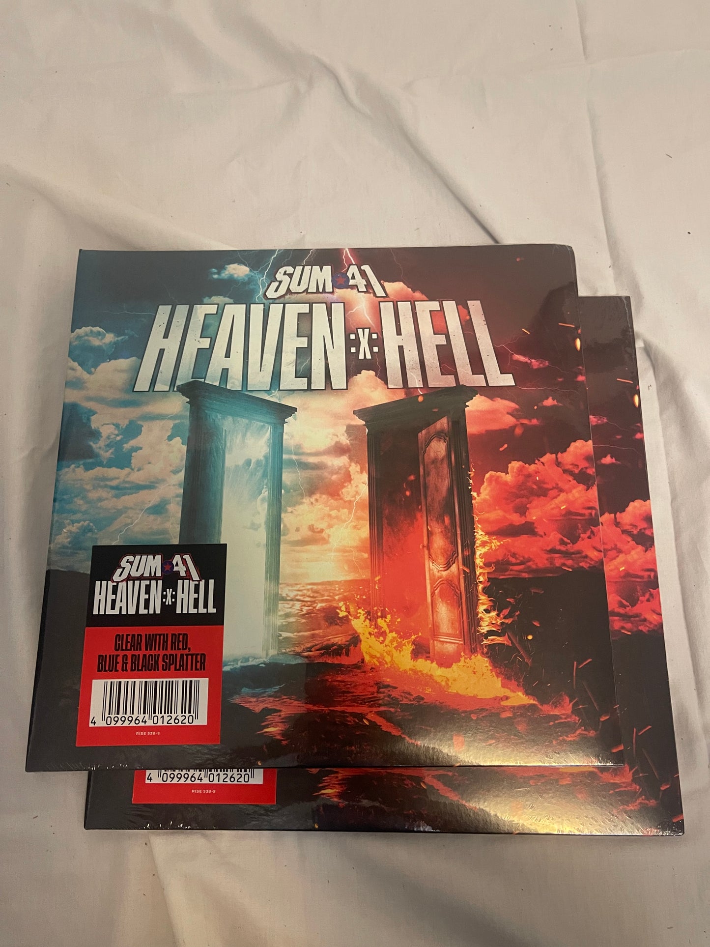 Sum 41 - Heaven :x: Hell (exclusive clear with red, blue, and black splatter vinyl)