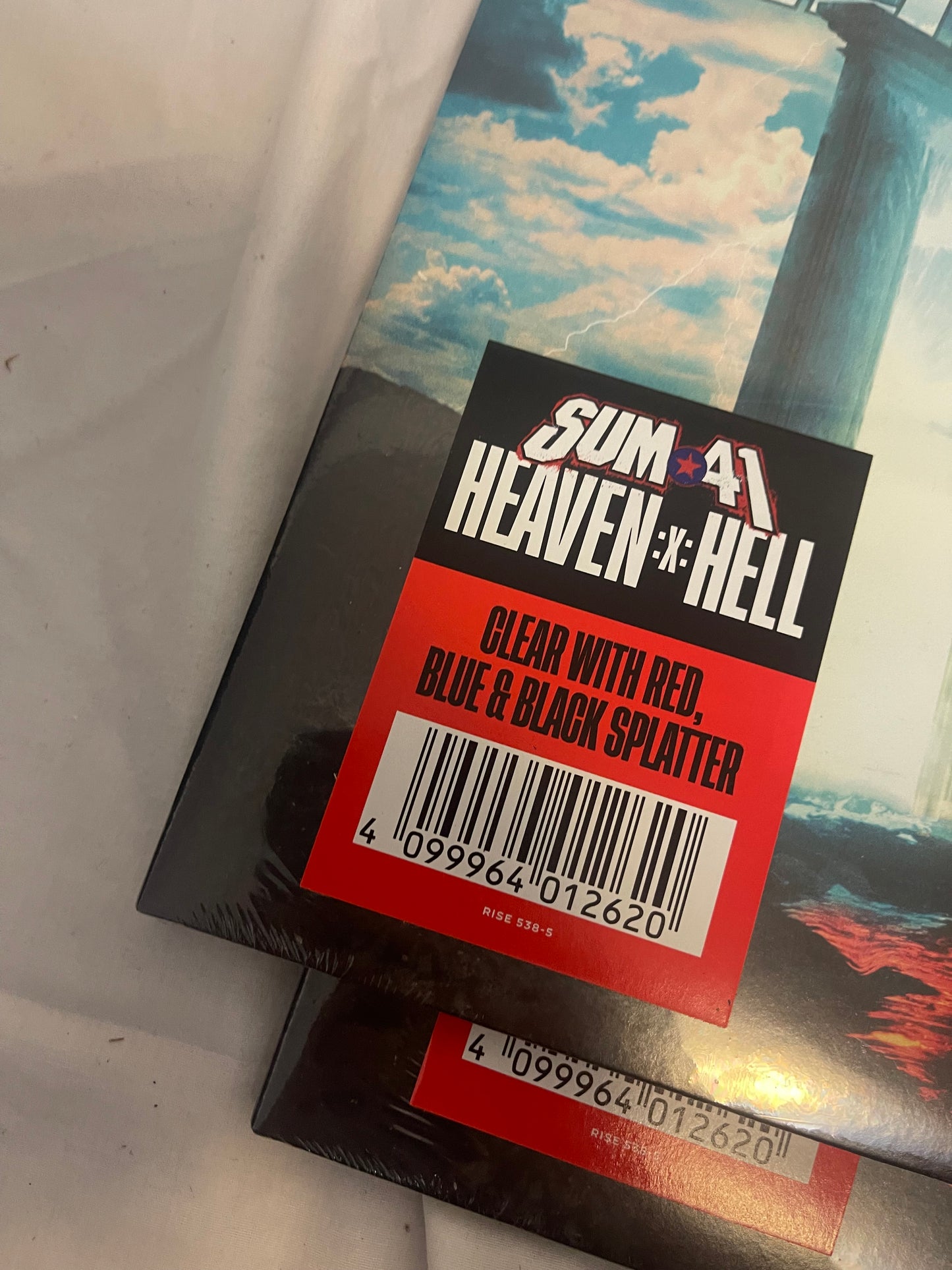 Sum 41 - Heaven :x: Hell (exclusive clear with red, blue, and black splatter vinyl)