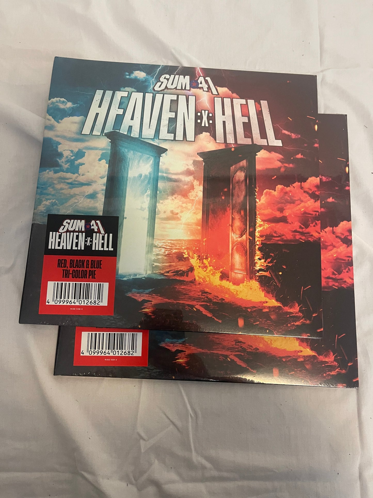 Sum 41 - Heaven :x: Hell (exclusive red, black, and blue tri-color pie vinyl)