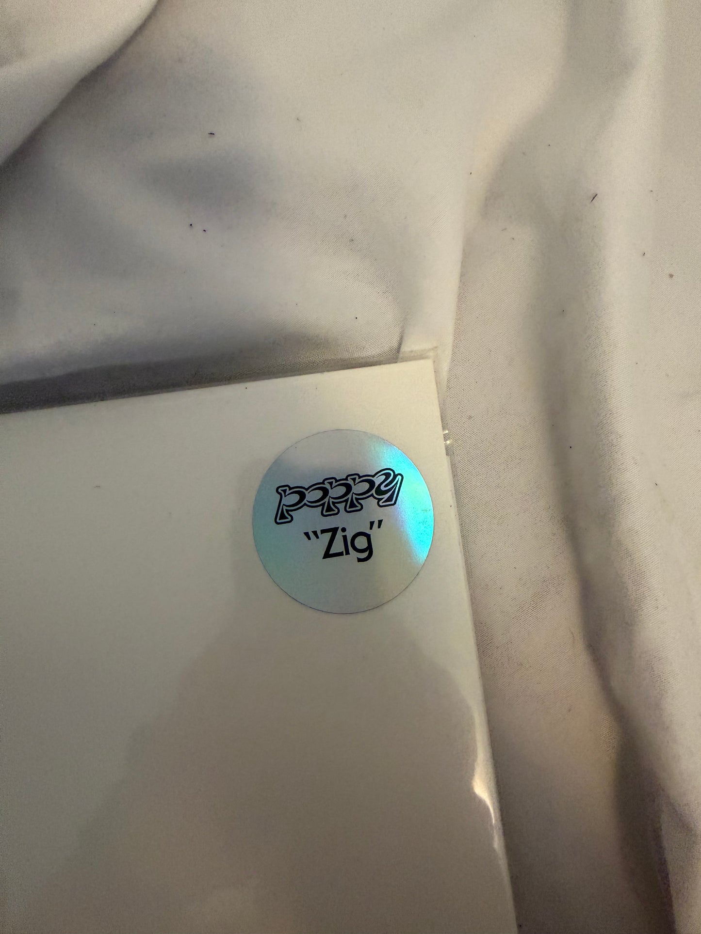 Poppy - Zig (Sumerian exclusive ultra clear with black/mint green/baby blue splatter vinyl)