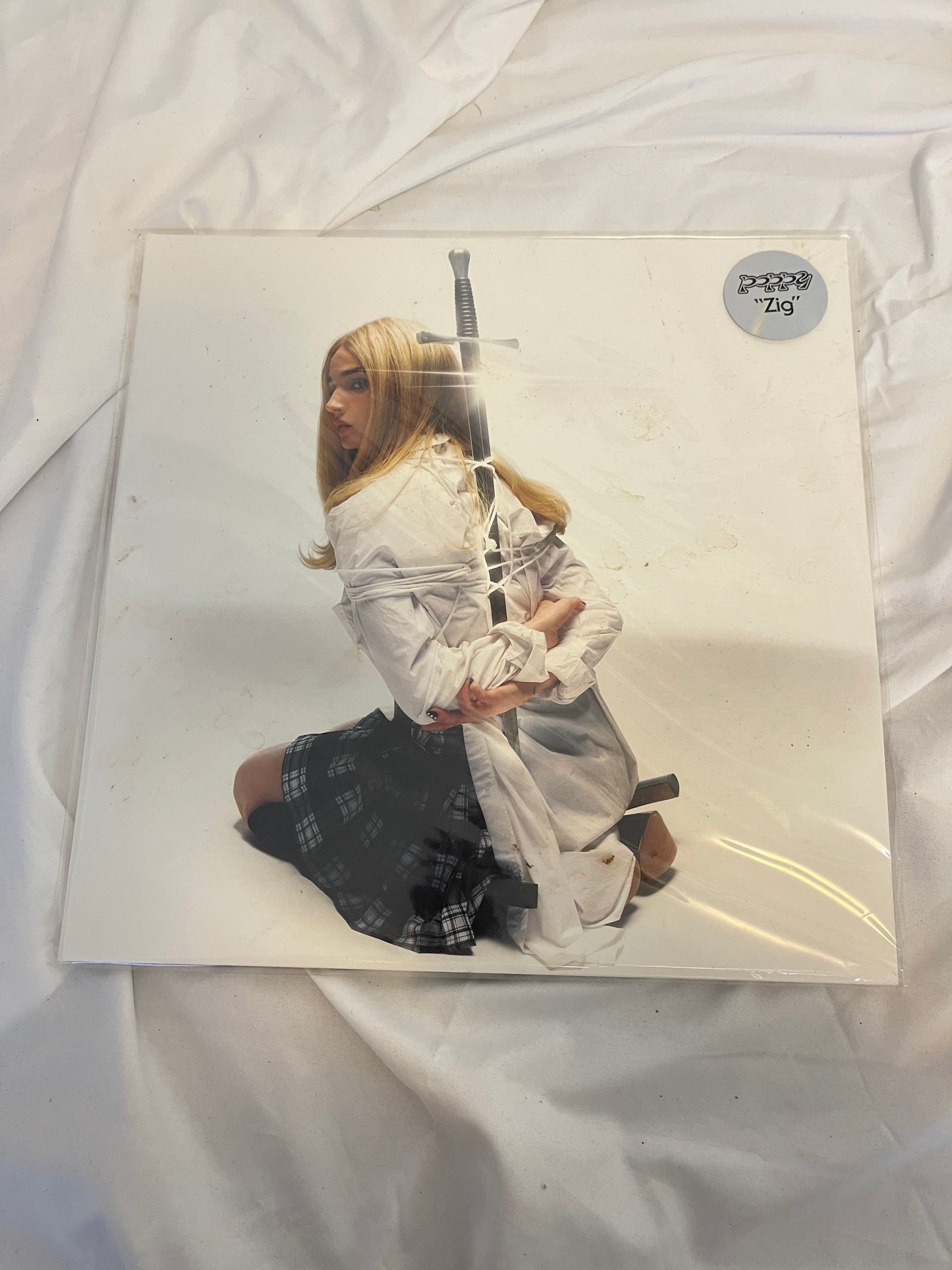 Poppy - Zig (Exclusive black inside transparent purple with heavy black splatter vinyl)