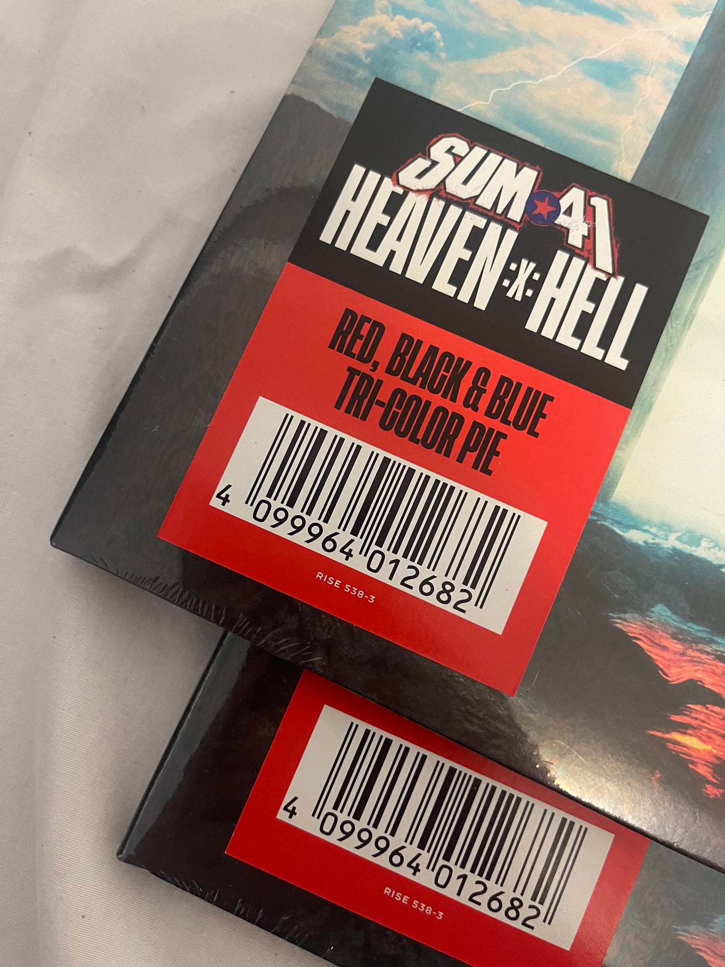 Sum 41 - Heaven :x: Hell (exclusive red, black, and blue tri-color pie vinyl)