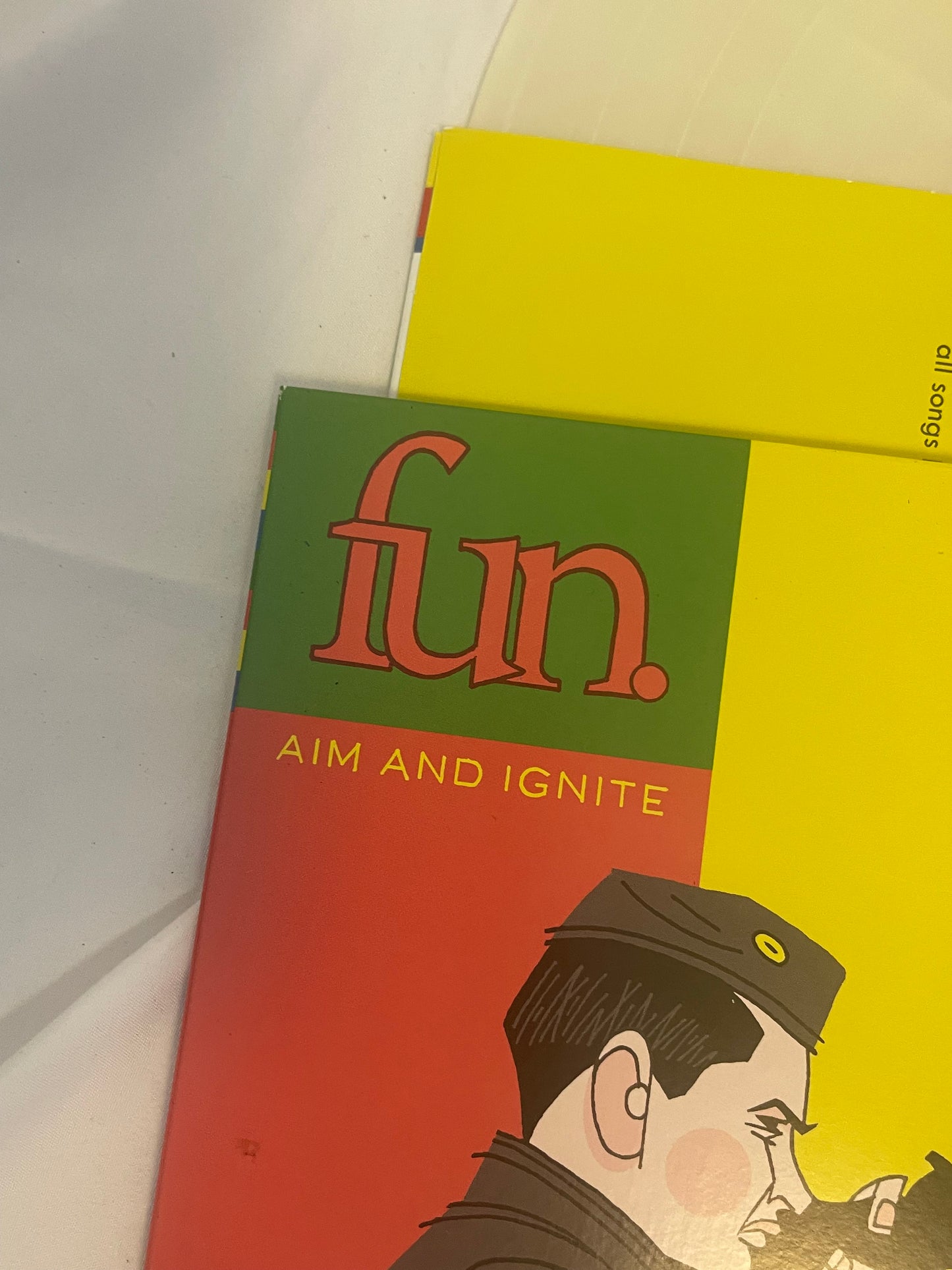 fun. - Aim And Ignite (Newbury Comics exclusive clear with opaque yellow and neon green twist vinyl)
