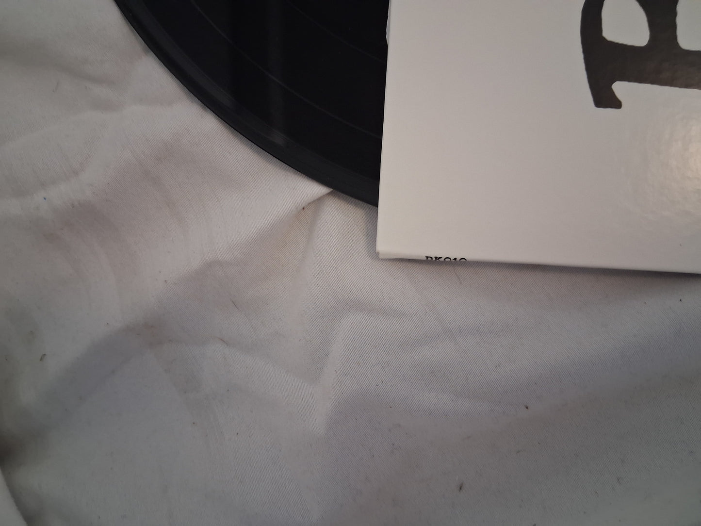 Bikini Kill - The Singles (Newbury comics exclusive clear and black split vinyl)
